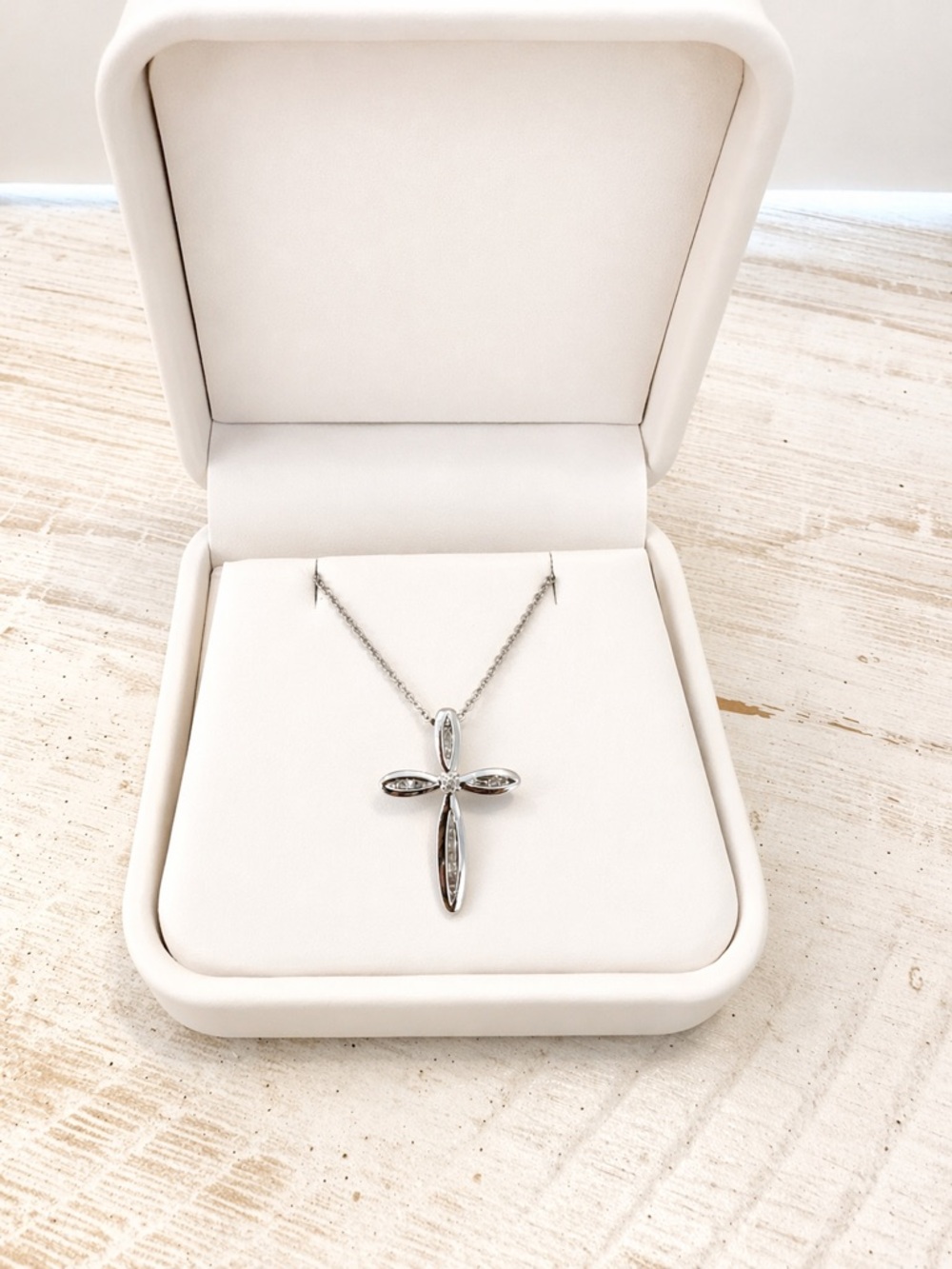 14 karat white gold, and diamond cross necklace